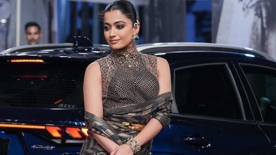 Rashmika Mandanna turned showstopper for JJ Valaya at Lakme Fashion Week. She wore a black and golden saree outfit. Rashmika Mandanna turned showstopper for JJ Valaya at Lakme Fashion Week. She wore a black and golden saree outfit.
