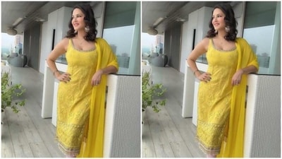Sunny looked stunning as ever in the yellow salwar featuring sleeveless details, silver zari work throughout the body, teamed with pink churidaar pants. She added a yellow silk dupatta on her one shoulder. (Instagram/@sunnyleone) Sunny looked stunning as ever in the yellow salwar featuring sleeveless details, silver zari work throughout the body, teamed with pink churidaar pants. She added a yellow silk dupatta on her one shoulder. (Instagram/@sunnyleone)