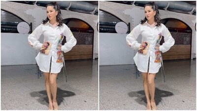 Sunny's shirt dress came with multicoloured embellished details on both sides of the waist. She teamed it with a sequined skirt and added the necessary bling. (Instagram/@sunnyleone) Sunny's shirt dress came with multicoloured embellished details on both sides of the waist. She teamed it with a sequined skirt and added the necessary bling. (Instagram/@sunnyleone)
