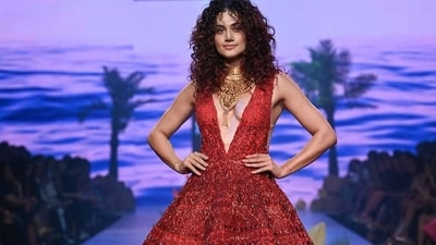 Taapsee Pannu turned showstopper for Monisha Jaising at Lakme Fashion Week in partnership with FDCI. She wore a shimmery red gown. Taapsee Pannu turned showstopper for Monisha Jaising at Lakme Fashion Week in partnership with FDCI. She wore a shimmery red gown. 