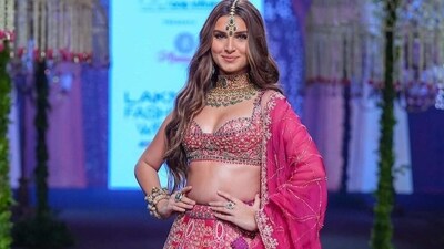 Tara Sutaria turned showstopper for designer label Annu’s Creation at Lakme Fashion Week. She wore a pink lehenga. Tara Sutaria turned showstopper for designer label Annu’s Creation at Lakme Fashion Week. She wore a pink lehenga. 