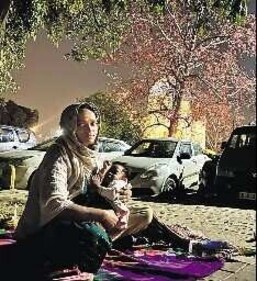Fatima Begum lives on the pavement with three-year-old daughter, Ifra, near the Subz Burj monument. On post-Holi evenings, she likes to watch the blossoming semal tree inside the monument complex. “My ammi cooks dishes using these flowers,” she said. Fatima Begum lives on the pavement with three-year-old daughter, Ifra, near the Subz Burj monument. On post-Holi evenings, she likes to watch the blossoming semal tree inside the monument complex. “My ammi cooks dishes using these flowers,” she said.