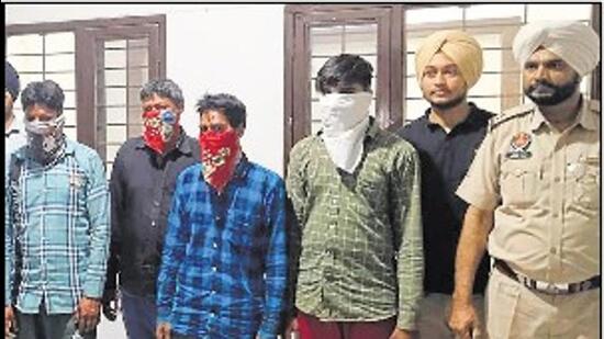 The four accused in the custody of Koomkalan police on Sunday. Police said that the accused were involved in drug peddling and had provided drug to the victim. (HT photo)