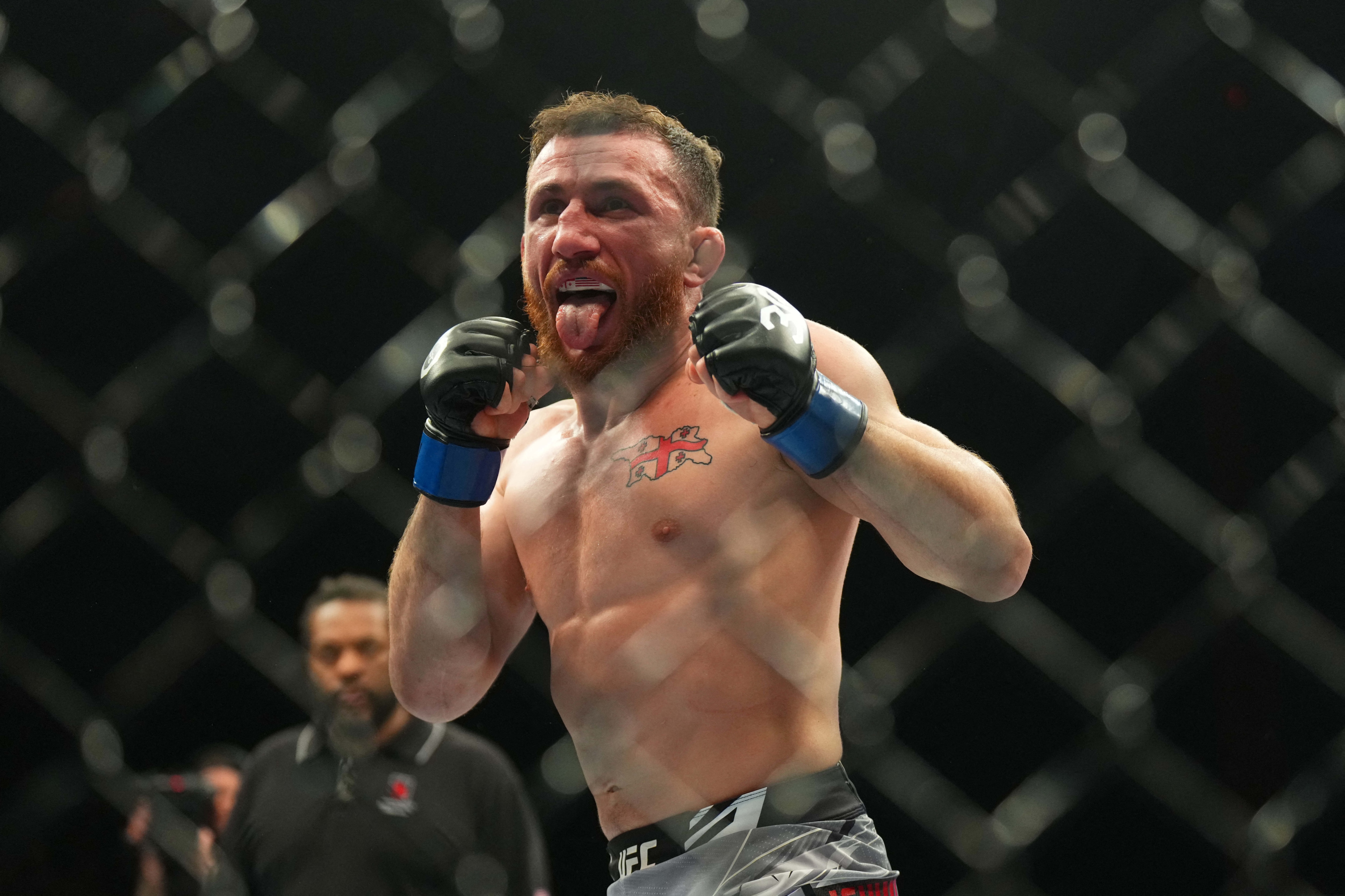 Petr Yan (red gloves) fights Merab Dvalshvili (blue gloves) during UFC Fight Night at Virgin Hotel. (USA TODAY Sports)