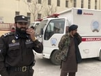 Taliban fighters stand guard outside the hospital after a bomb blast in Mazar-e Sharif, the capital city of Balkh province, in northern Afghanistan. (AP) Taliban fighters stand guard outside the hospital after a bomb blast in Mazar-e Sharif, the capital city of Balkh province, in northern Afghanistan. (AP)