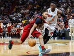 Cleveland Cavaliers guard Darius Garland (10) drives to the basket as Miami Heat guard Victor Oladipo (4) defends during the fourth quarter at Miami-Dade Arena.