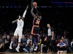 New York Knicks forward Julius Randle (30) shoots over Los Angeles Lakers forward Jarred Vanderbilt (2) during the first half of an NBA basketball game Sunday, March 12, 2023, in Los Angeles. New York Knicks forward Julius Randle (30) shoots over Los Angeles Lakers forward Jarred Vanderbilt (2) during the first half of an NBA basketball game Sunday, March 12, 2023, in Los Angeles.
