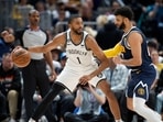 Brooklyn Nets forward Mikal Bridges, left, looks to drive to the basket as Denver Nuggets guard Jamal Murray defends in the second half of an NBA basketball game Sunday, March 12, 2023, in Denver. Brooklyn Nets forward Mikal Bridges, left, looks to drive to the basket as Denver Nuggets guard Jamal Murray defends in the second half of an NBA basketball game Sunday, March 12, 2023, in Denver.