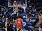 New Orleans Pelicans guard Trey Murphy III (25) dunks in the second half for to bring his total to 41 points in an NBA basketball game against the Portland Trail Blazers in New Orleans, Sunday, March 12, 2023. New Orleans Pelicans guard Trey Murphy III (25) dunks in the second half for to bring his total to 41 points in an NBA basketball game against the Portland Trail Blazers in New Orleans, Sunday, March 12, 2023.