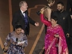Director Kartiki Gonsalves and producer Guneet Monga accepting the Oscar. Director Kartiki Gonsalves and producer Guneet Monga accepting the Oscar.