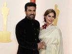 Ram Charan, left, and Upasana Kamineni arrive at the Oscars on Sunday, March 12, 2023, at the Dolby Theatre in Los Angeles. (Photo by Jordan Strauss/Invision/AP) Ram Charan, left, and Upasana Kamineni arrive at the Oscars on Sunday, March 12, 2023, at the Dolby Theatre in Los Angeles. (Photo by Jordan Strauss/Invision/AP)