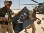 A portrait of toppled Iraqi President Saddam Hussein A portrait of toppled Iraqi President Saddam Hussein