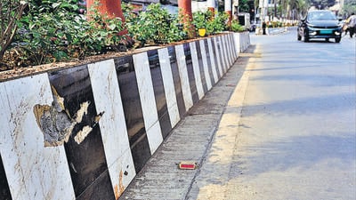 A civic official from D ward, when contacted, said that the tiles had not been prohibited by the vigilance department. “We will take a decision later,” he said. “So far this has been successful and is aesthetically appealing. To keep the tiles looking good, we just have to send labourers to clean them, which is done in a jiffy. Repainting soiled dividers is, in fact, much more expensive. Also, we have not yet encountered sites of tiles breaking as they are properly laid and cemented.” (Anshuman Poyrekar/HT PHOTO) A civic official from D ward, when contacted, said that the tiles had not been prohibited by the vigilance department. “We will take a decision later,” he said. “So far this has been successful and is aesthetically appealing. To keep the tiles looking good, we just have to send labourers to clean them, which is done in a jiffy. Repainting soiled dividers is, in fact, much more expensive. Also, we have not yet encountered sites of tiles breaking as they are properly laid and cemented.” (Anshuman Poyrekar/HT PHOTO)