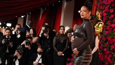 Rihanna arrives at the Oscars on Sunday, March 12, 2023, at the Dolby Theatre in Los Angeles. (Photo by Jordan Strauss/Invision/AP) (Jordan Strauss/Invision/AP) Rihanna arrives at the Oscars on Sunday, March 12, 2023, at the Dolby Theatre in Los Angeles. (Photo by Jordan Strauss/Invision/AP) (Jordan Strauss/Invision/AP)