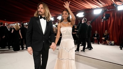 Zoe Saldana attends the Oscars Awards ceremony with her partner Marco Perego Saldana. (John Locher/Invision/AP) Zoe Saldana attends the Oscars Awards ceremony with her partner Marco Perego Saldana. (John Locher/Invision/AP)