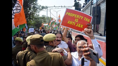 Jammu and Kashmir Pradesh Congress Committee workers being detained during a protest march against the Adani Group, property tax, Aptech JKSSB scam, and delayed elections in Jammu and Kashmir, in Jammu on Monday. (ANI)