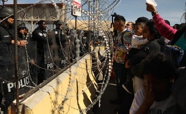 Migrants, mostly of Venezuelan origin, attempt to forcibly cross into the United States at the Paso del Norte International Bridge in Ciudad Juarez, Chihuahua state, Mexico. (AP) Migrants, mostly of Venezuelan origin, attempt to forcibly cross into the United States at the Paso del Norte International Bridge in Ciudad Juarez, Chihuahua state, Mexico. (AP)