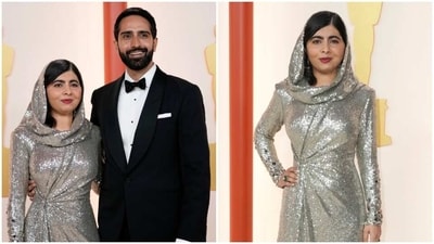 Malala Yousafzai debuts at the Oscars with husband Asser Malik. (AP) Malala Yousafzai debuts at the Oscars with husband Asser Malik. (AP)