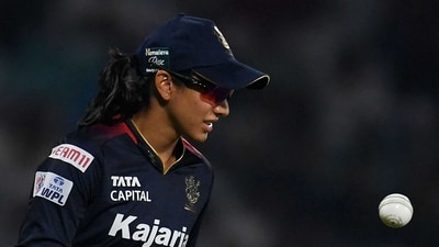 Royal Challengers Bangalore slumped to their fifth consecutive defeat as Delhi Capitals chased down a target of 151 with six wickets and two balls to spare. Captain Smriti Mandhana's nightmare season continued but Ellyse Perry scored a half century in a whirlwind death over attack with Richa Ghosh. DCl, however, went about the chase systematically and completed it in the last over. (AFP) Royal Challengers Bangalore slumped to their fifth consecutive defeat as Delhi Capitals chased down a target of 151 with six wickets and two balls to spare. Captain Smriti Mandhana's nightmare season continued but Ellyse Perry scored a half century in a whirlwind death over attack with Richa Ghosh. DCl, however, went about the chase systematically and completed it in the last over. (AFP)