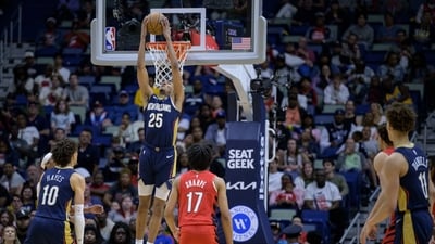 New Orleans Pelicans guard Trey Murphy III (25) dunks in the second half for to bring his total to 41 points in an NBA basketball game against the Portland Trail Blazers in New Orleans, Sunday, March 12, 2023. (AP) New Orleans Pelicans guard Trey Murphy III (25) dunks in the second half for to bring his total to 41 points in an NBA basketball game against the Portland Trail Blazers in New Orleans, Sunday, March 12, 2023. (AP)
