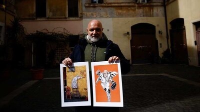 Graffiti artist 'Maupal' known for having painted murals depicting Pope Francis as Superman poses for a photo outside his apartment near the Vatican two days before the 10th anniversary of Pope Francis' election to papacy in Rome, Italy, March 11, 2023. ( REUTERS/Guglielmo Mangiapane) Graffiti artist 'Maupal' known for having painted murals depicting Pope Francis as Superman poses for a photo outside his apartment near the Vatican two days before the 10th anniversary of Pope Francis' election to papacy in Rome, Italy, March 11, 2023. ( REUTERS/Guglielmo Mangiapane)