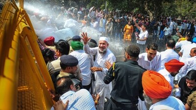 Chandigarh: Police personnel use water cannons to disperse Punjab Congress supporters during 'Chalo Raj Bhawan' march, in Chandigarh, Monday. (PTI) Chandigarh: Police personnel use water cannons to disperse Punjab Congress supporters during 'Chalo Raj Bhawan' march, in Chandigarh, Monday. (PTI)