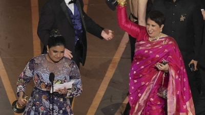 Director Kartiki Gonsalves and producer Guneet Monga accepting the Oscar. Director Kartiki Gonsalves and producer Guneet Monga accepting the Oscar.
