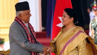 Outgoing President Bidhya Devi Bhandari, right, congratulates Nepal's newly elected president Ram Chandra Poudel, after he took the oath of office at the presidential building "Shital Niwas" in Kathmandu, Nepal, Monday, (AP) Outgoing President Bidhya Devi Bhandari, right, congratulates Nepal's newly elected president Ram Chandra Poudel, after he took the oath of office at the presidential building "Shital Niwas" in Kathmandu, Nepal, Monday, (AP)