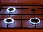 A 3 burner gas stove makes multitasking in kitchen easy. 