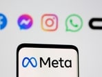 The Meta logo on smartphone in front of logo of Facebook, Messenger, Instagram, WhatsApp, Oculus in this illustration picture taken October 28, 2021. REUTERS/Dado Ruvic/Illustration/File Photo