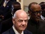 FIFA president Gianni Infantino and Rwanda's President Paul Kagame arrive for the CAF President's Outstanding Achievement Awards, in Kigali