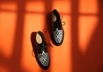 A good pair of party wear shoes can elevate the look, and how!