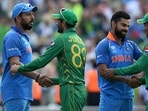 Yuvraj Singh and Virat Kohli shaking hands with Pakistan players. Yuvraj Singh and Virat Kohli shaking hands with Pakistan players.