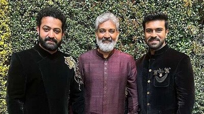 SS Rajamouli with the stars of RRR, Jr NTR and Ram Charan, at the 95th Academy Awards, in Los Angeles on Sunday. (ANI Photo) (Ram Charan Twitter) SS Rajamouli with the stars of RRR, Jr NTR and Ram Charan, at the 95th Academy Awards, in Los Angeles on Sunday. (ANI Photo) (Ram Charan Twitter)