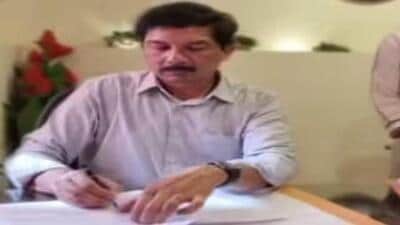 BJP leader Babulal Marandi released a 22-second video of Rajiv Arun Ekka, signing a file, allegedly at a private office owned by one Vishal Chaudhary, who is under ED scanner. BJP leader Babulal Marandi released a 22-second video of Rajiv Arun Ekka, signing a file, allegedly at a private office owned by one Vishal Chaudhary, who is under ED scanner.