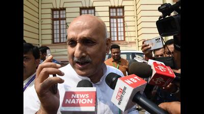 Bihar education minister Prof. Chandrashekhar interacts with the media outside the Assembly on Tuesday. (Santosh Kumar/HT Photo) Bihar education minister Prof. Chandrashekhar interacts with the media outside the Assembly on Tuesday. (Santosh Kumar/HT Photo)