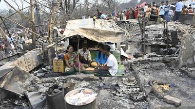 Mumbai, India - Mar 14, 2023 : Pictures from Malad's Appa Pada area where nearly 800 homes were destroyed after a Massive fire broke out on March 13, Killing 1, in Mumbai, India, on Tuesday, Mar 14, 2023.(Photo by Vijay Bate/HT Photo) Mumbai, India - Mar 14, 2023 : Pictures from Malad's Appa Pada area where nearly 800 homes were destroyed after a Massive fire broke out on March 13, Killing 1, in Mumbai, India, on Tuesday, Mar 14, 2023.(Photo by Vijay Bate/HT Photo)