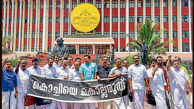 Opposition MLAs led by Leader of the Opposition VD Satheesan stage a walkout from the Kerala Legislative Assembly protesting against the fire at Brahmapuram Waste Treatment Plant, in Thiruvananthapuram (PTI) Opposition MLAs led by Leader of the Opposition VD Satheesan stage a walkout from the Kerala Legislative Assembly protesting against the fire at Brahmapuram Waste Treatment Plant, in Thiruvananthapuram (PTI)