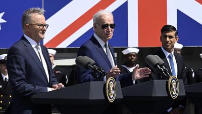 President Joe Biden (centre), speaks as Australian Prime Minister Anthony Albanese (left) and British Prime Minister Rishi Sunak listen at Naval Base Point Loma, in San Diego, US, on Monday. (AP)