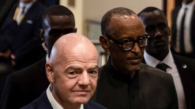 FIFA president Gianni Infantino and Rwanda's President Paul Kagame arrive for the CAF President's Outstanding Achievement Awards, in Kigali (REUTERS)