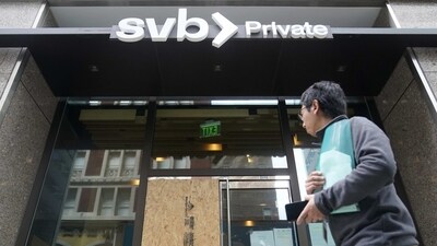 A pedestrian passes a Silicon Valley Bank Private branch in San Francisco on Monday. (AP)