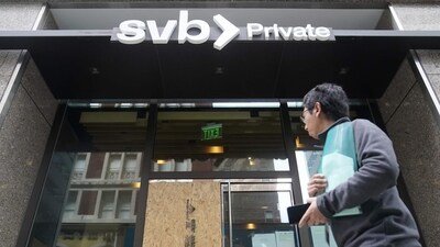 A pedestrian passes a Silicon Valley Bank Private branch in San Francisco on Monday. (AP)