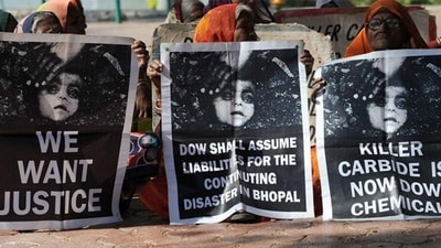Bhopal gas disaster survivors hold posters during a protest rally. (AFP file) Bhopal gas disaster survivors hold posters during a protest rally. (AFP file)