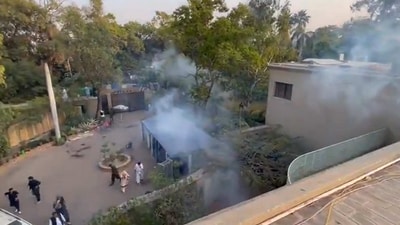 Tear gas used against Imran Khan's supporters outside his residence in Lahore. (Hindustan Times) Tear gas used against Imran Khan's supporters outside his residence in Lahore. (Hindustan Times)
