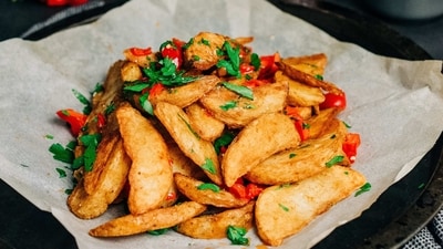 Crispy Potato Wedges: Cut potatoes into wedges, toss in olive oil, and sprinkle with salt and pepper. Roast in the oven until crispy on the outside and soft on the inside. Serve with your favourite dipping sauce. (Unsplash) Crispy Potato Wedges: Cut potatoes into wedges, toss in olive oil, and sprinkle with salt and pepper. Roast in the oven until crispy on the outside and soft on the inside. Serve with your favourite dipping sauce. (Unsplash)