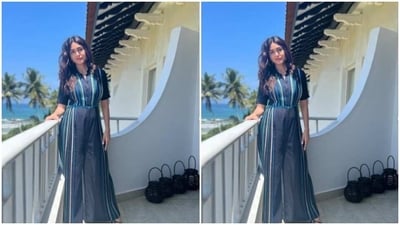 Mrunal decked up in a blue summer jumpsuit featuring a closed neckline, long sleeves, stripes in shades of blue and wide legs.&nbsp; (Instagram/@mrunalthakur)