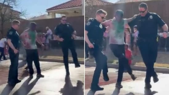 The image is taken from the video that shows two US cops dancing to Naatu Naatu. (Twitter/@Nenavat_Jagan)