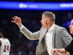 Nate Oats of the Alabama Crimson Tide signals to the court against the Texas A&M Aggies in the second half of the 2023 SEC Men's Basketball Tournament Championship game.