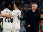 Real Madrid coach Carlo Ancelotti remonstrates with Vinicius Junior as Dani Ceballos looks on after the match 