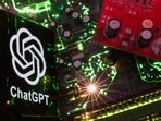 A smartphone with a displayed ChatGPT logo is placed on a computer motherboard in this illustration taken February 23, 2023. REUTERS/Dado Ruvic/Illustration